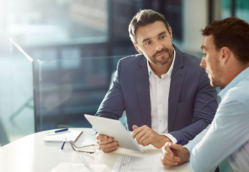 Two men in discussion